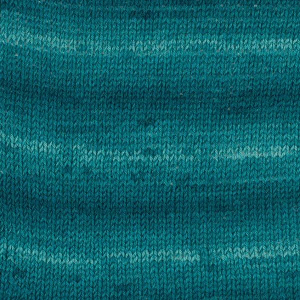 DROPS Fabel Long Print 918 smaragdy